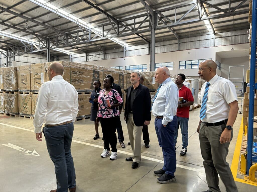 IMG_3491 Group of people talking in a warehouse